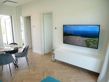 Фото номера Дом с 1 спальней Дома для отпуска Sea pearl holiday home г. Кунигишкяй 74