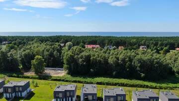 Фото номера Дом с 1 спальней Дома для отпуска Sea pearl holiday home г. Кунигишкяй 65
