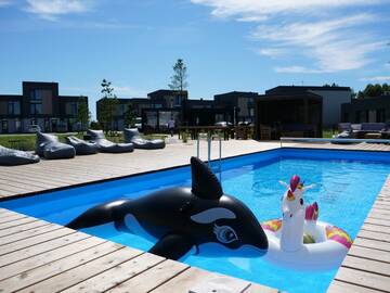 Фото номера Дом с 1 спальней Дома для отпуска Sea pearl holiday home г. Кунигишкяй 10
